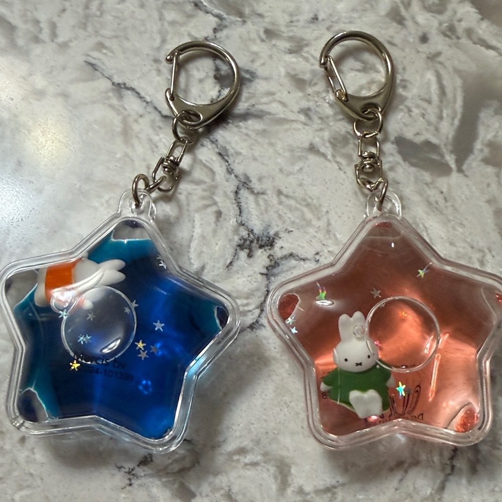 Two miffy star water keychains
